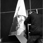 Plakat und Mann