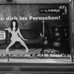Plakat und Schuhe